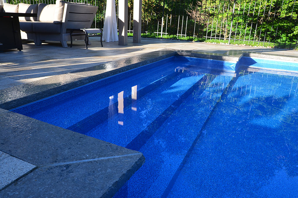marbelite pool with stone coping